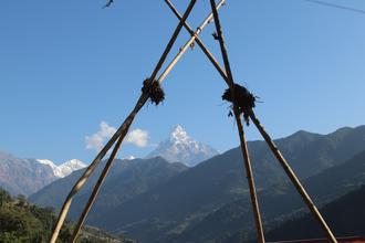 Machhapuchhre through a swing frame