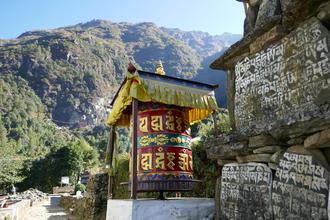 Prayer wheel and Mantra stone
